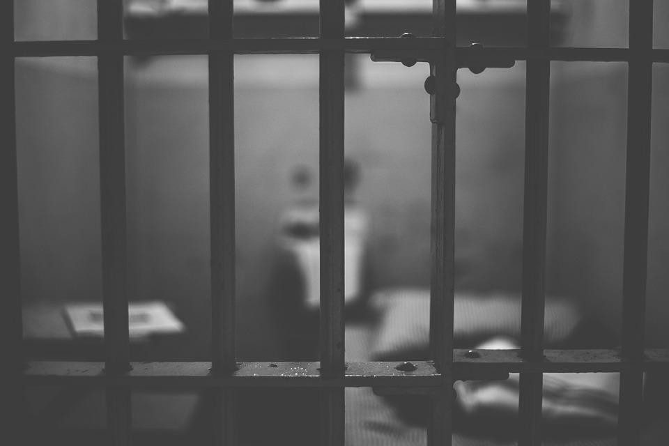 Image of a jail cell by Pixabay
