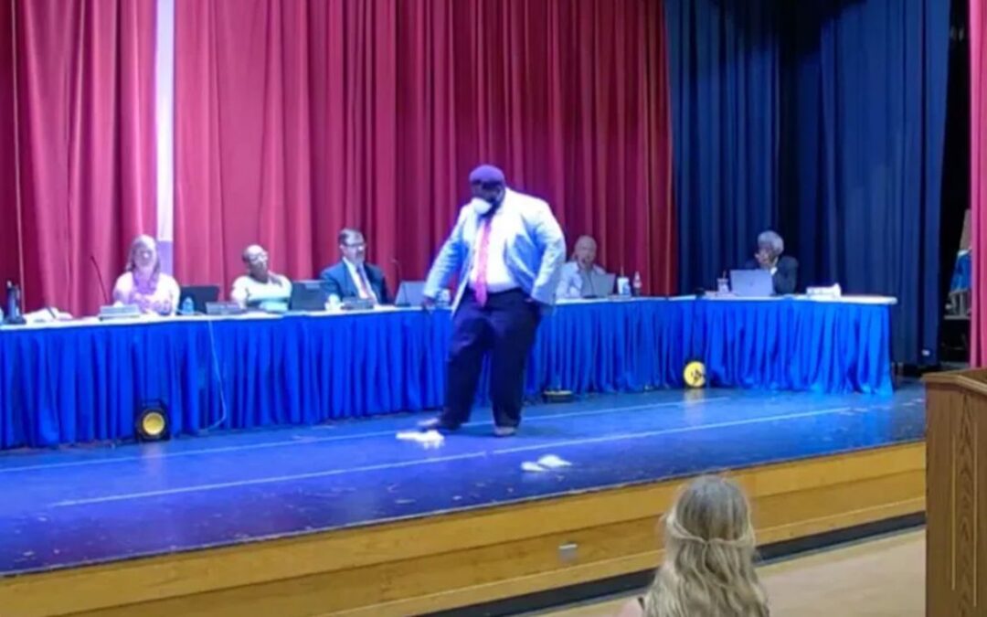 Parent Throws Chicken Feed at School Board
